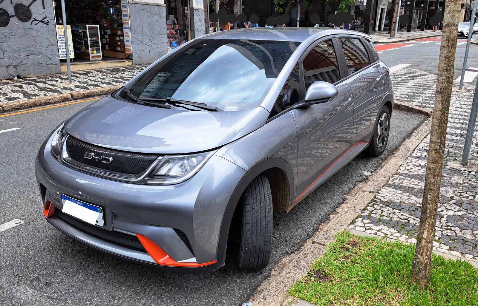 BYD Dolphin 2024 — front three-quarter view